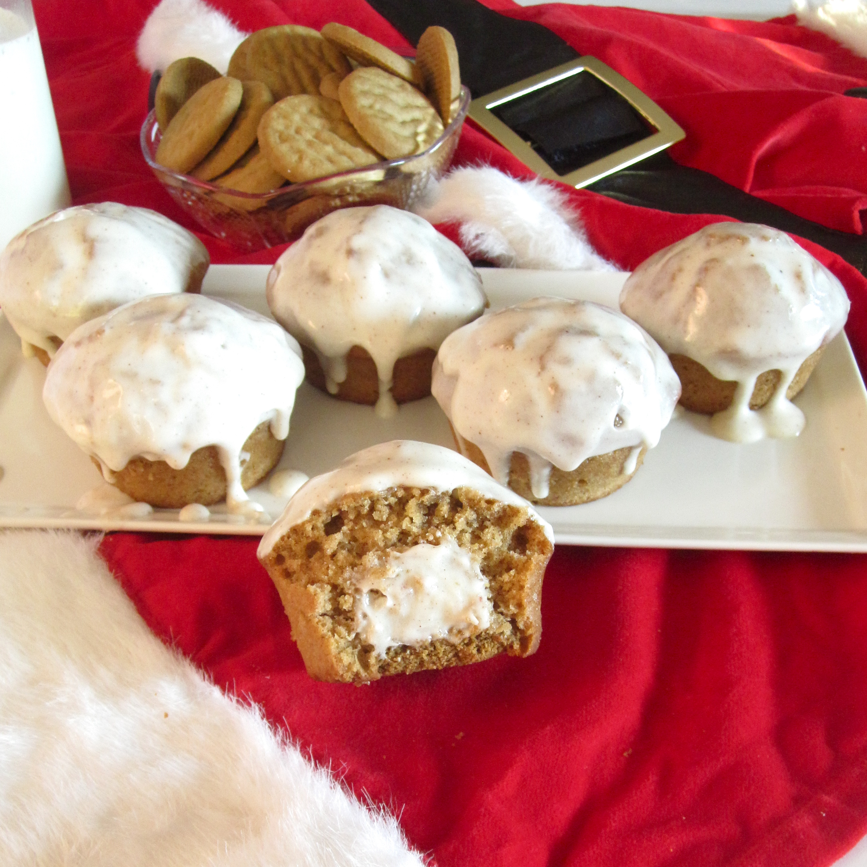 Glazed Eggnog Cheesecake Pumpkin Muffins with Gingerbread Cookie Crust